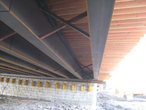 The beams beneath the Grand Avenue Bridge.