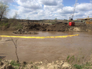 Water flows through the Middle River bridge project area.