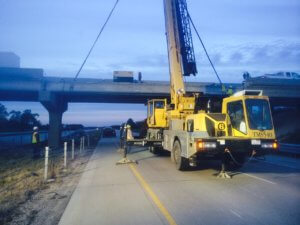 A beam is removed from a bridge on I-35 in Warren County.