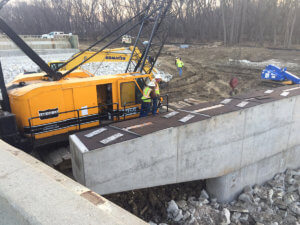 Crews prep the North River project for beam placement.